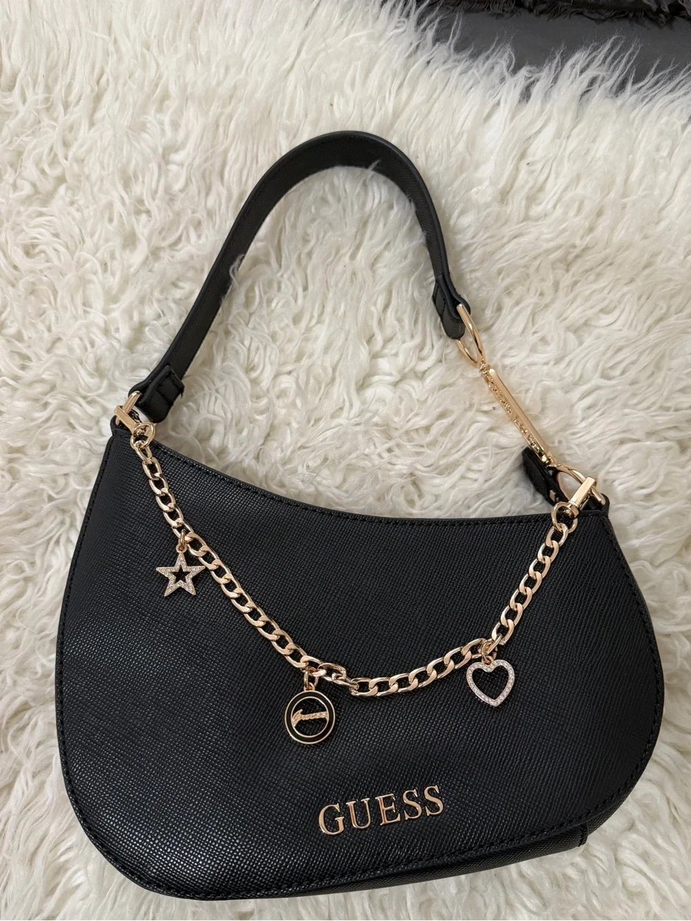 GUESS Black Crescent Shoulder Bag with Gold Charm Chain Accents